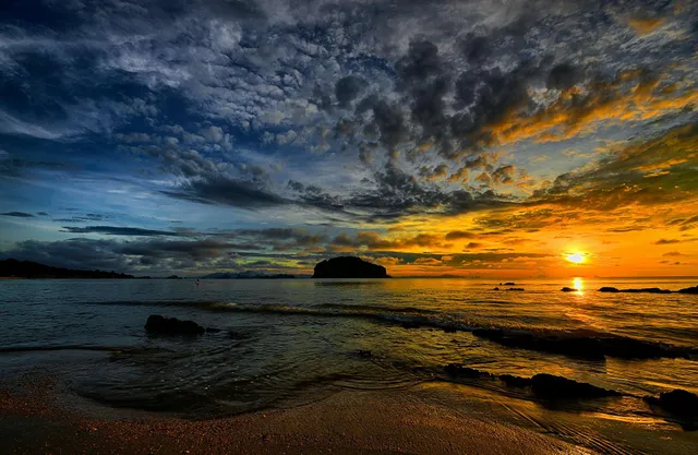 Bioluminescent plankton and sunset