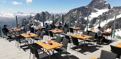Dine at Restaurant Piz Nair 10'000 feet on May 7, 2026