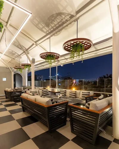 Dine at Project Charcoal Rooftop Restaurant on January 14, 2026
