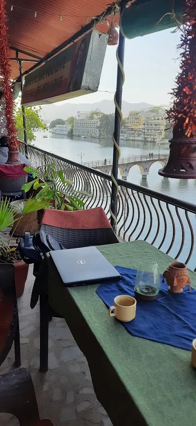 Dine at Chirag Roof Top Restaurant (lake view) on December 8, 2025