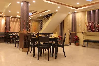 Dine at Qzine Restaurant on December 10, 2026