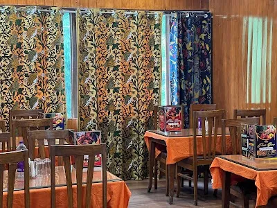 Dine at PINE VIEW RESTAURANT GULMARG on December 24, 2025