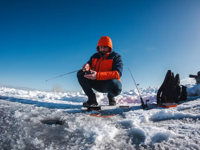 Ice fishing on a frozen lake